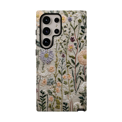 Intricate Embroidery Artwork Featuring Botanical Elements On Beige phone case design.