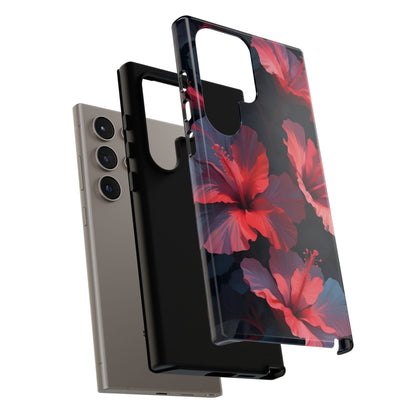 Vibrant red and pink hibiscus flowers blooming against a dark background| Floral phone case design