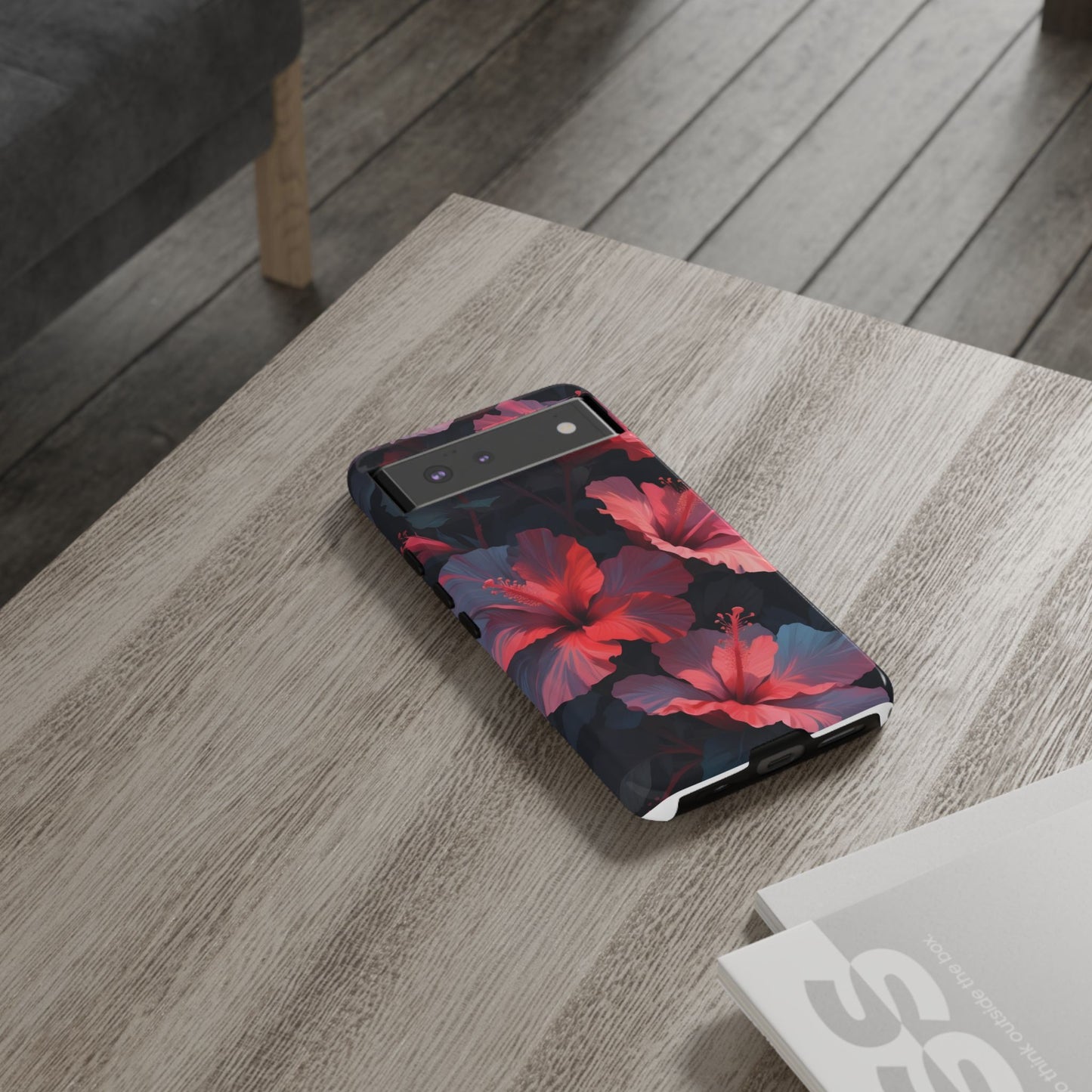 Vibrant red and pink hibiscus flowers blooming against a dark background| Floral phone case design