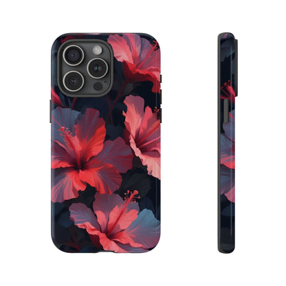 Vibrant red and pink hibiscus flowers blooming against a dark background| Floral phone case design