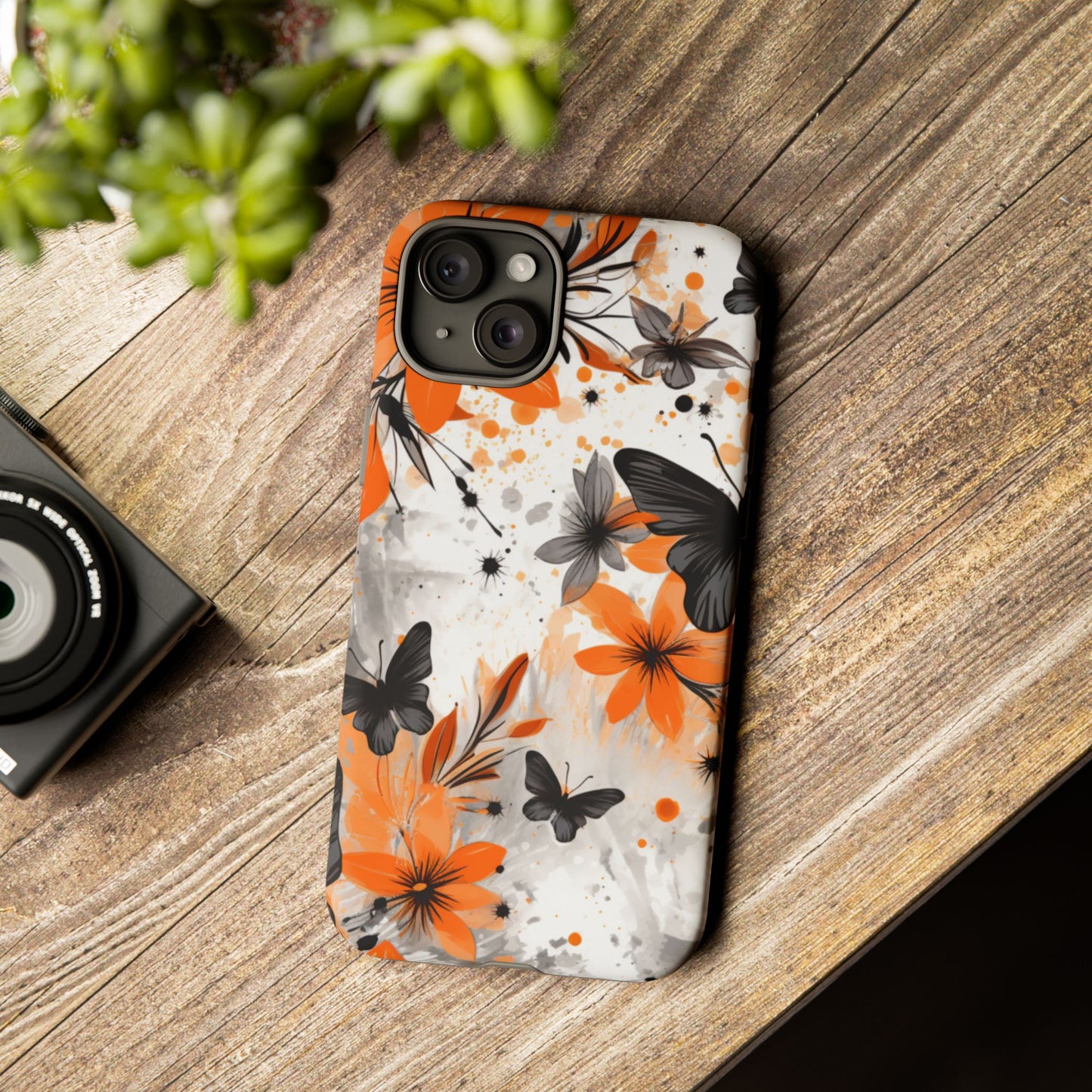 Bold Butterfly & Floral Splash Mobile Cover – Black & Orange Aesthetic