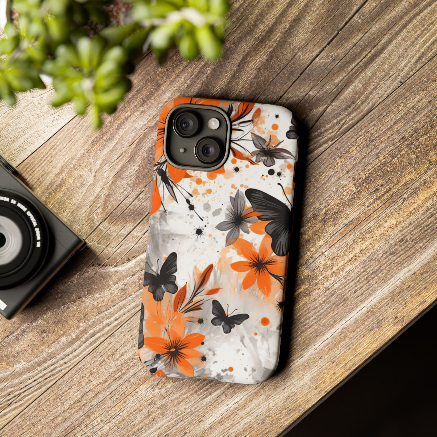 Bold Butterfly & Floral Splash Mobile Cover – Black & Orange Aesthetic