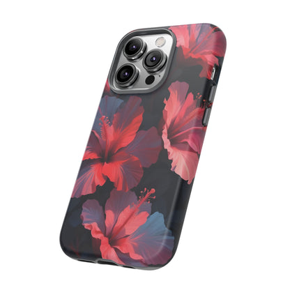 Vibrant red and pink hibiscus flowers blooming against a dark background| Floral phone case design