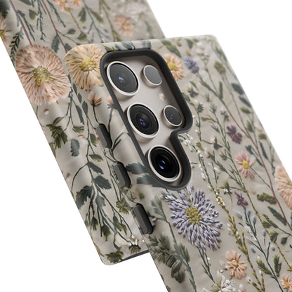 Intricate Embroidery Artwork Featuring Botanical Elements On Beige phone case design.