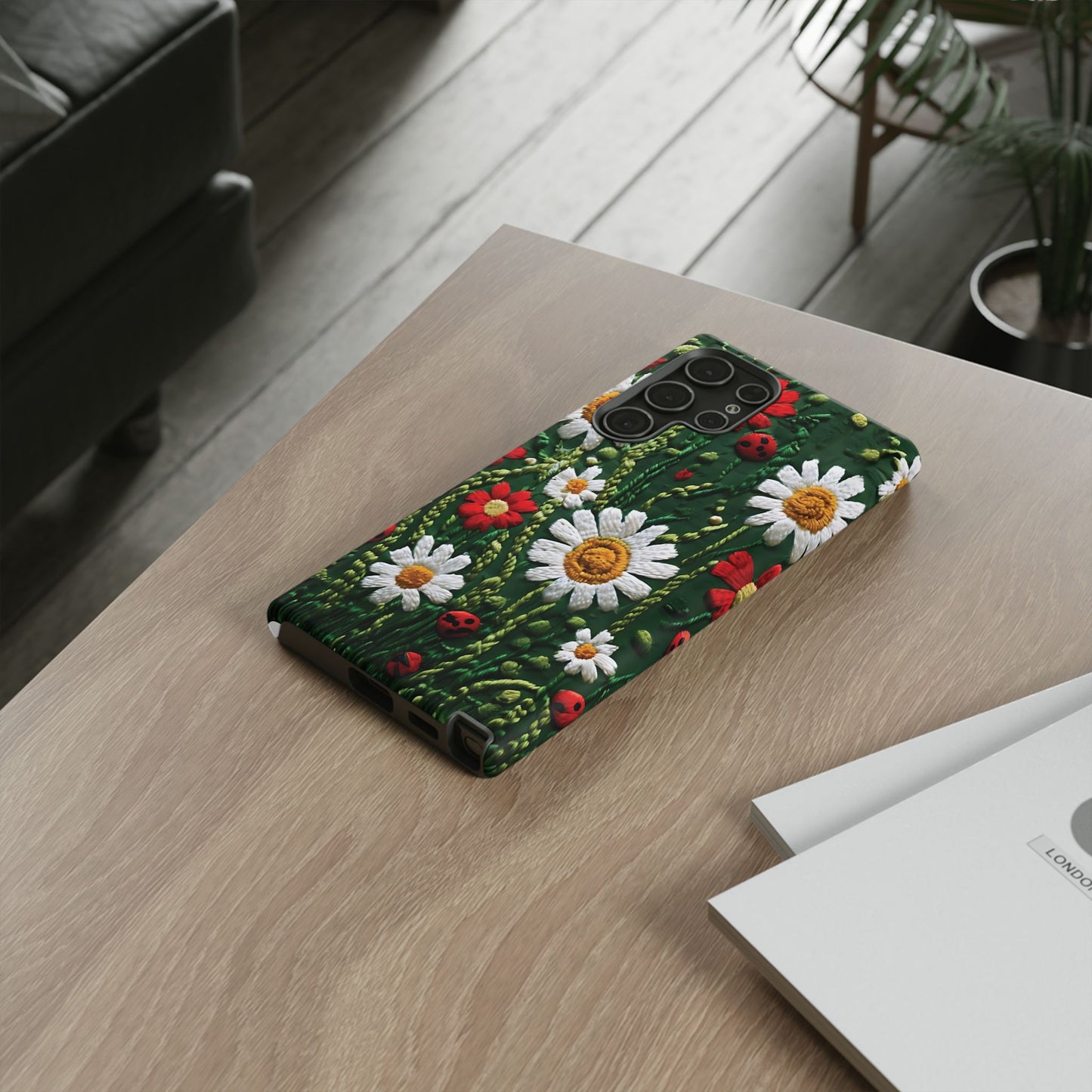 Intricate Embroidered Fabric Featuring Daisies And Ladybugs phone case design