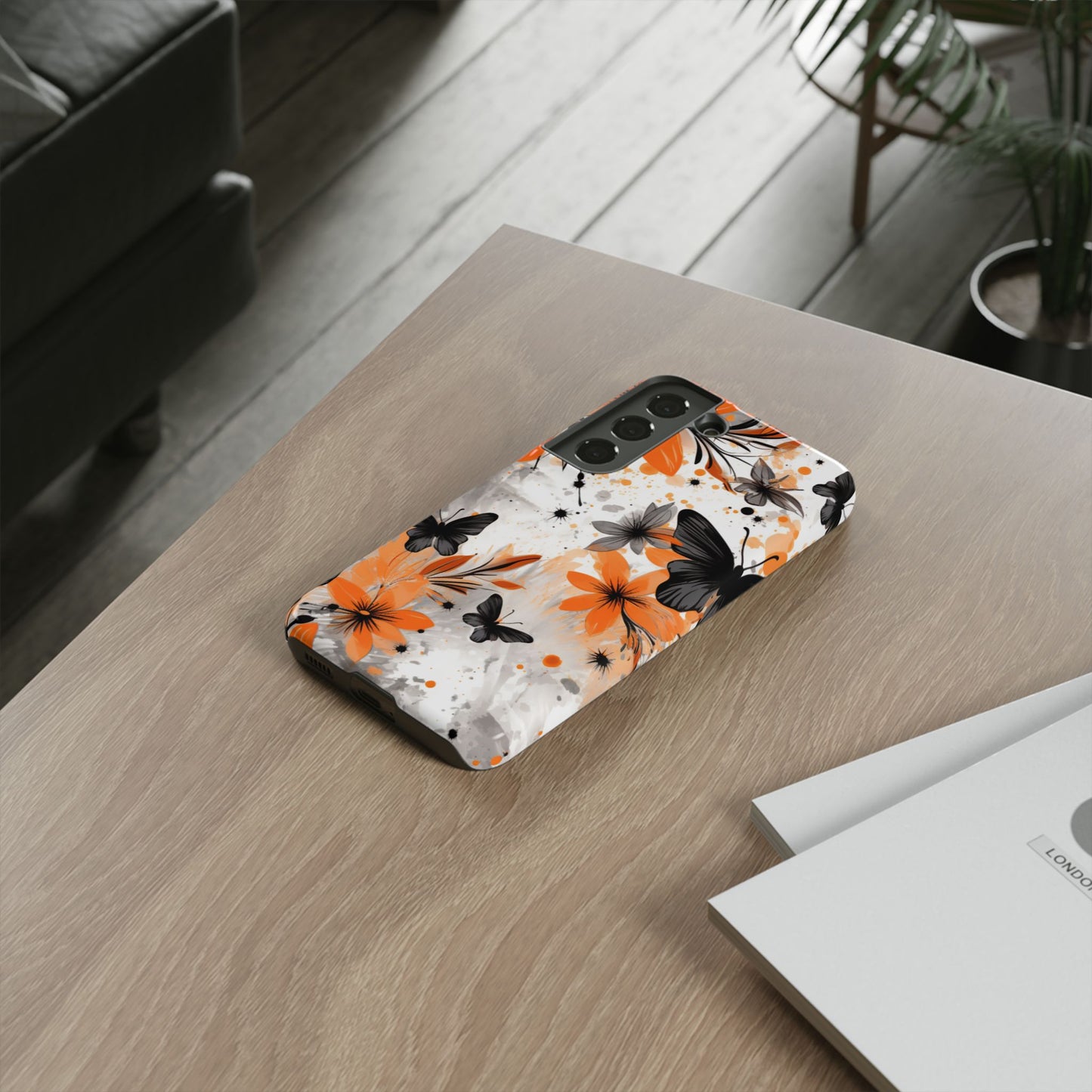 Bold Butterfly & Floral Splash Mobile Cover – Black & Orange Aesthetic