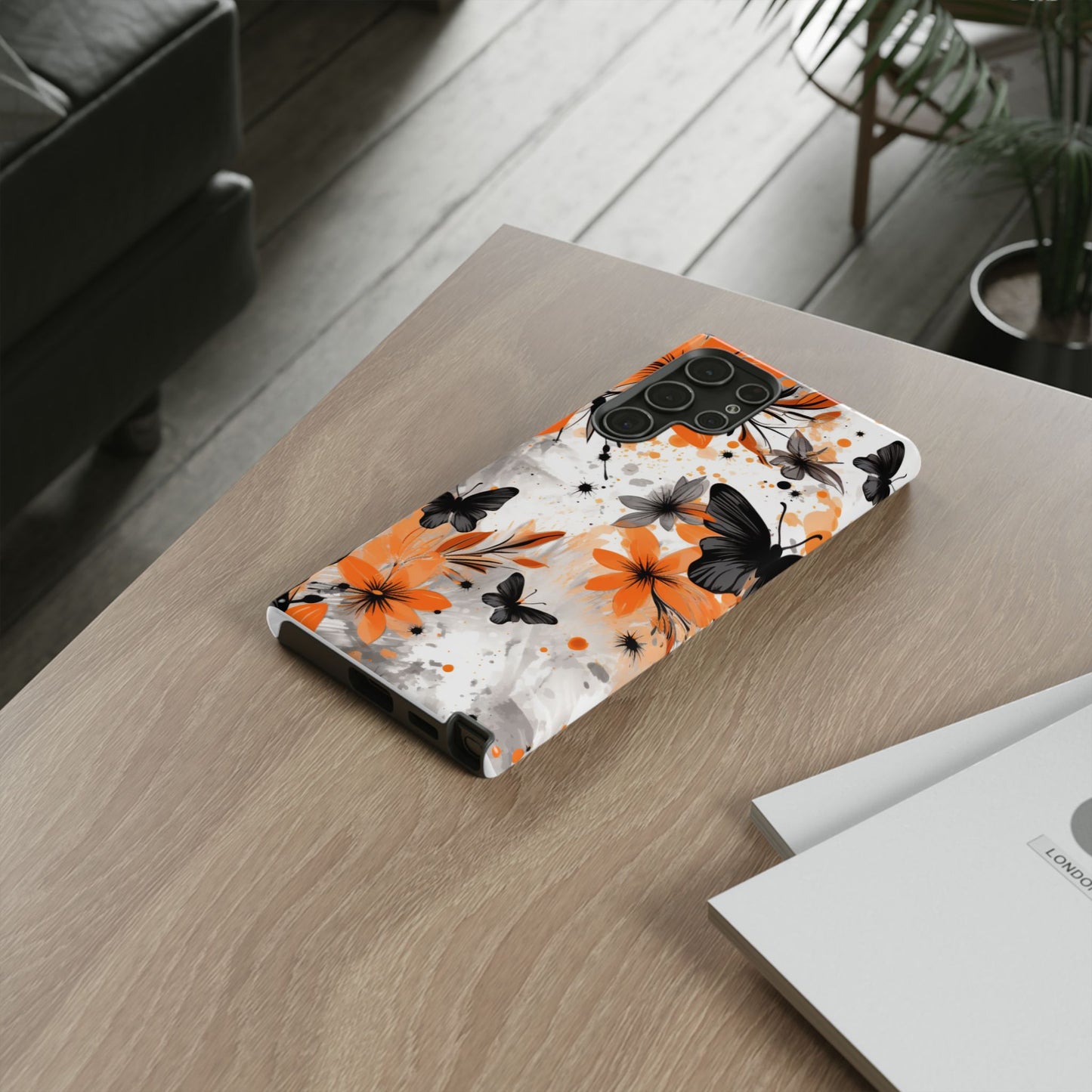 Bold Butterfly & Floral Splash Mobile Cover – Black & Orange Aesthetic