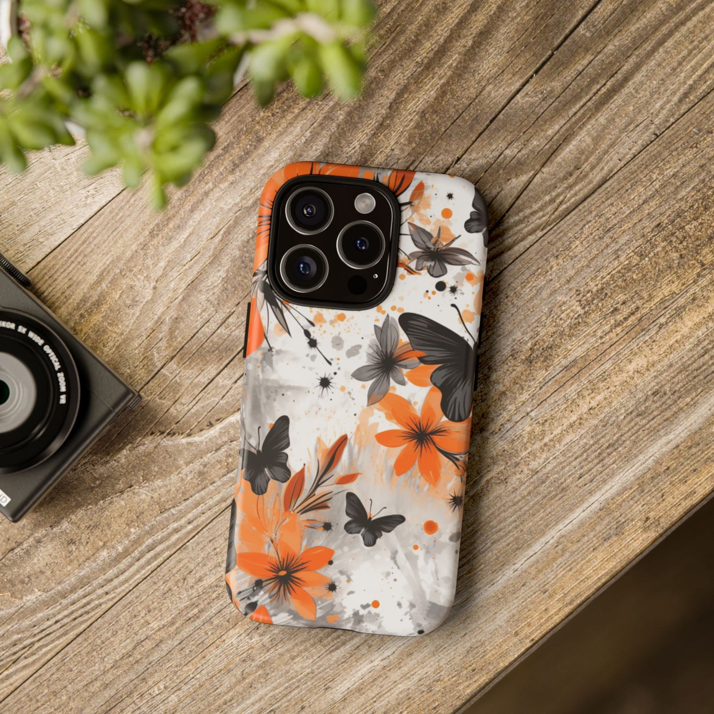 Bold Butterfly & Floral Splash Mobile Cover – Black & Orange Aesthetic