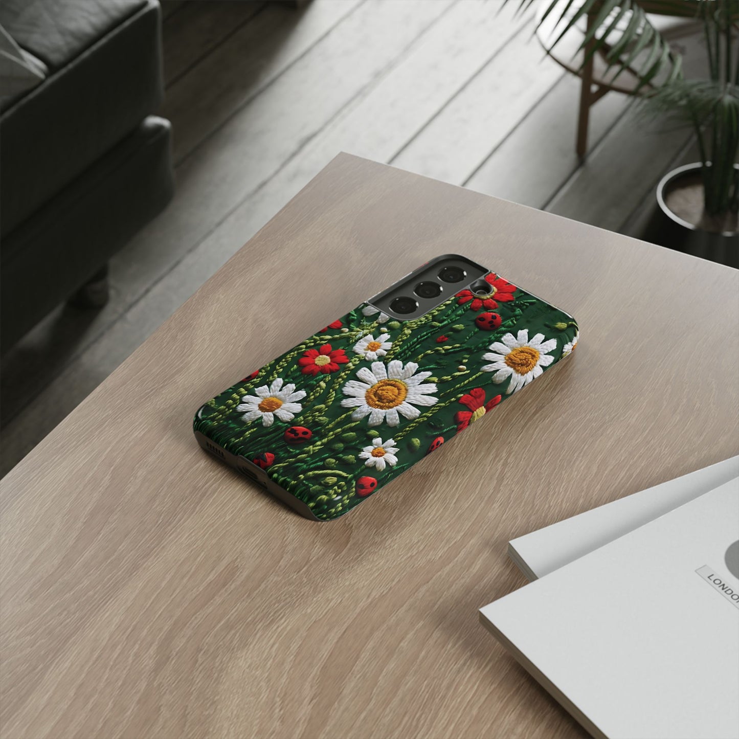 Intricate Embroidered Fabric Featuring Daisies And Ladybugs phone case design