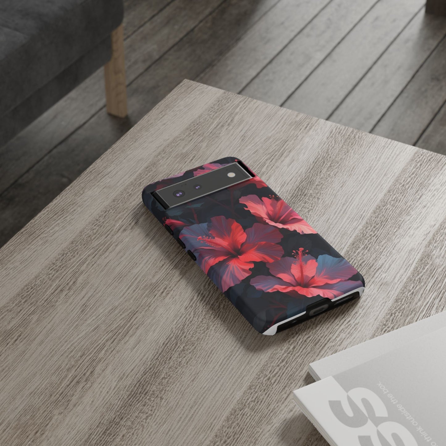 Vibrant red and pink hibiscus flowers blooming against a dark background| Floral phone case design