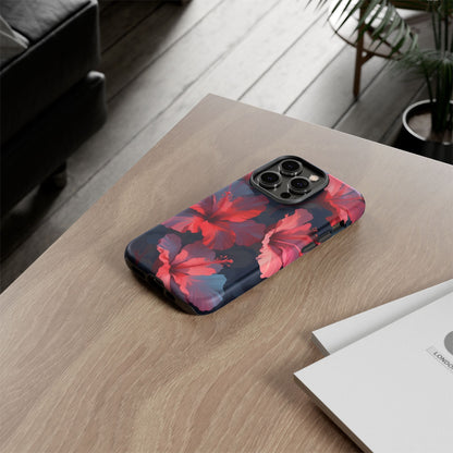 Vibrant red and pink hibiscus flowers blooming against a dark background| Floral phone case design