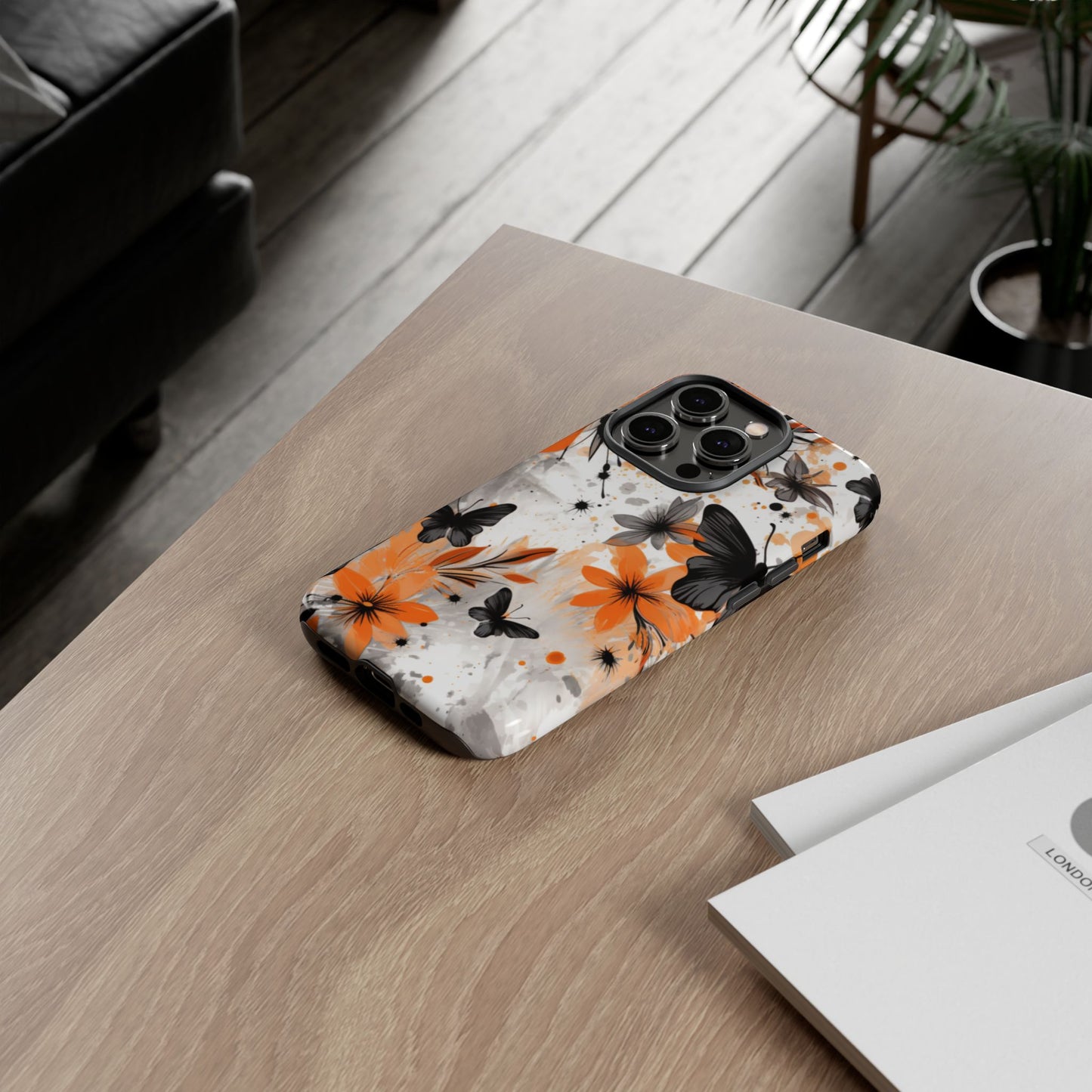 Bold Butterfly & Floral Splash Mobile Cover – Black & Orange Aesthetic
